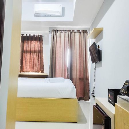 Comfy And Minimalist Studio At Vida View Apartment By Travelio Pampang Extérieur photo