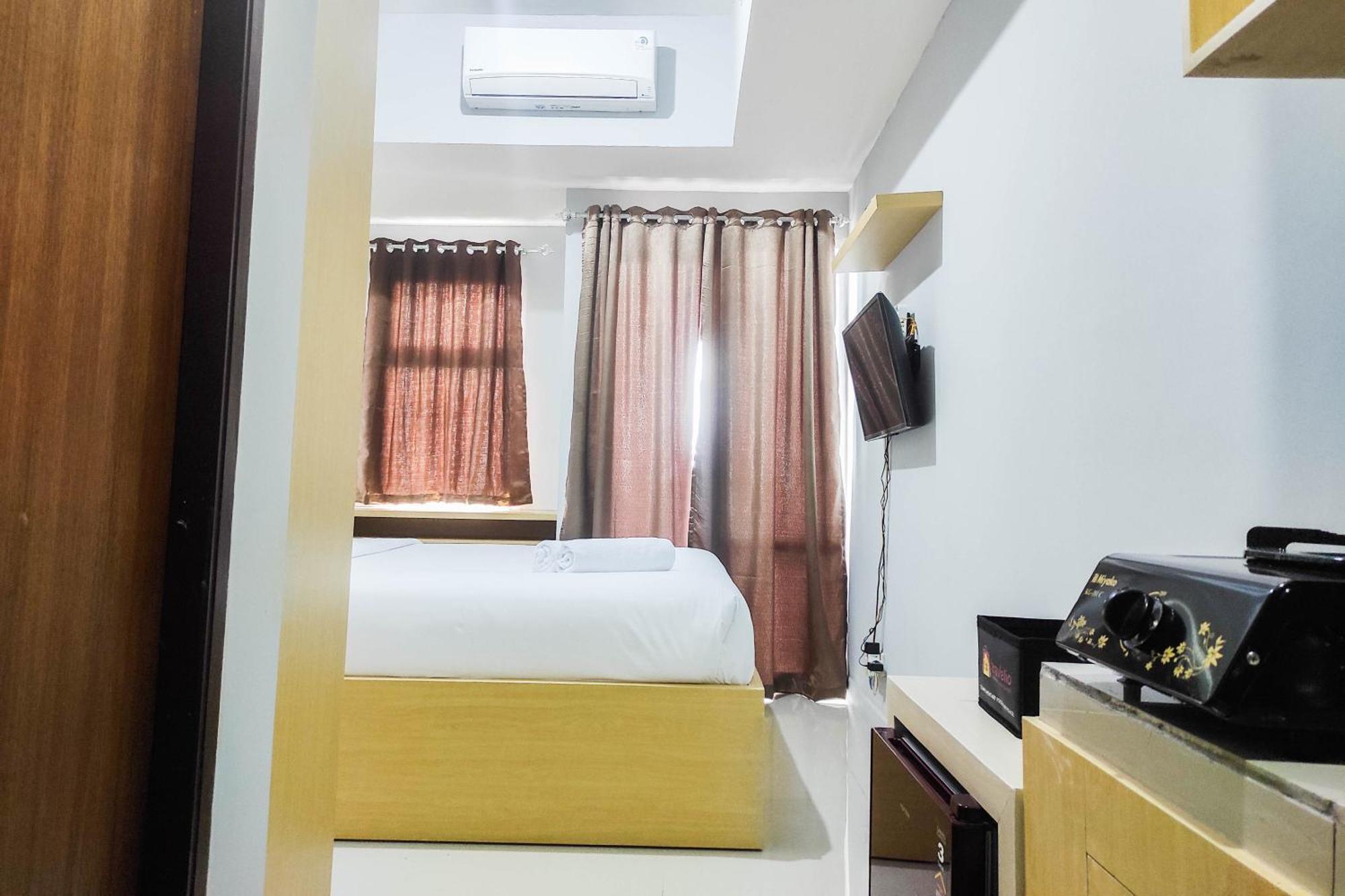 Comfy And Minimalist Studio At Vida View Apartment By Travelio Pampang Extérieur photo