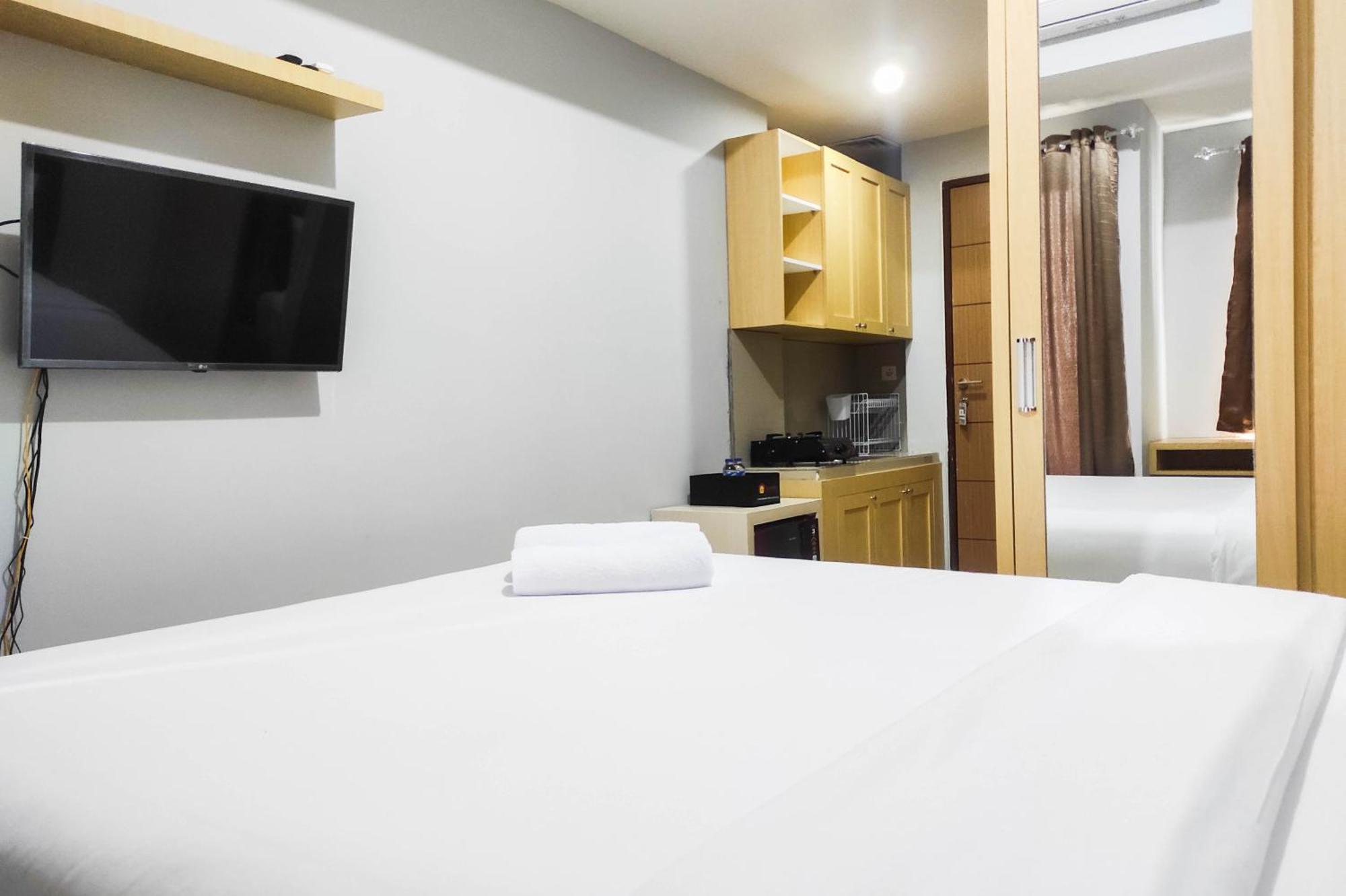 Comfy And Minimalist Studio At Vida View Apartment By Travelio Pampang Extérieur photo