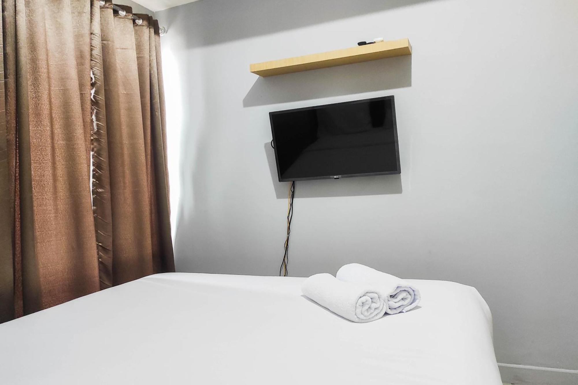 Comfy And Minimalist Studio At Vida View Apartment By Travelio Pampang Extérieur photo